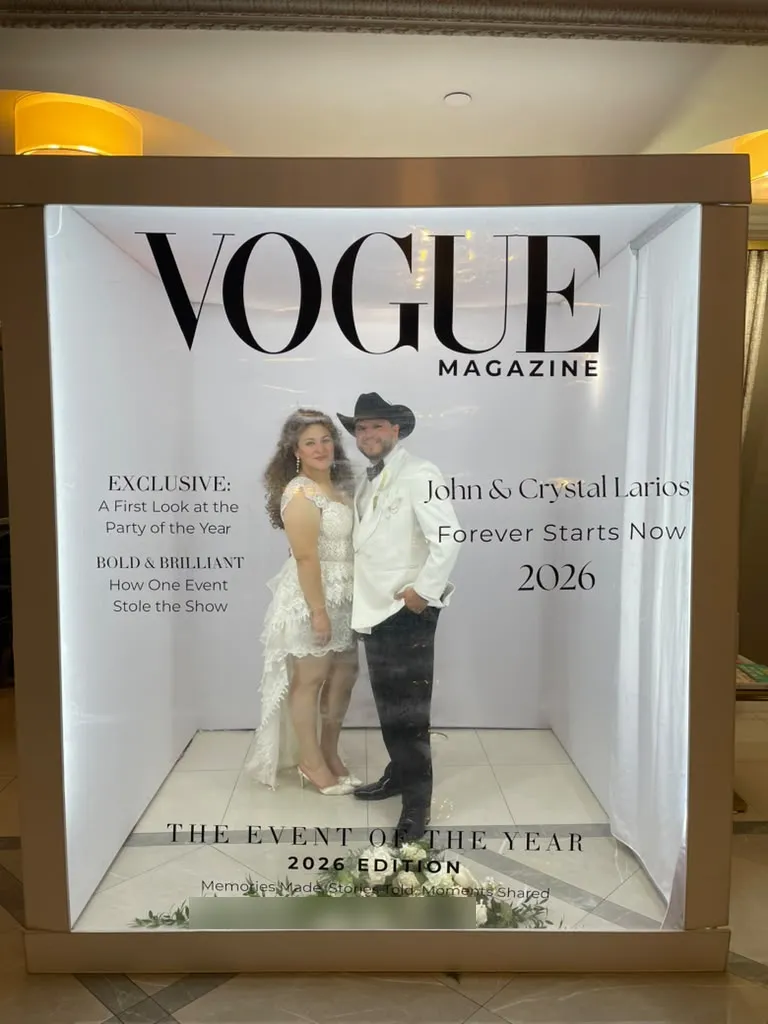 Couple in white posing on a custom magazine cover